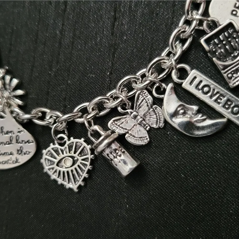 Teacher themed charm bracelet with books, coffee, crayons & inspirational charms